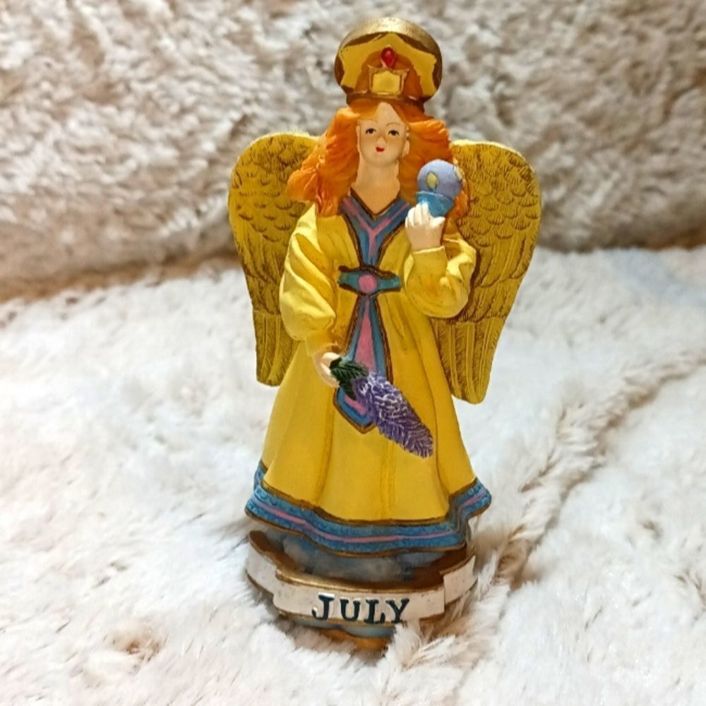1995 Chadwick Miller July Angel figurine. 1 of a 12 piece collection.